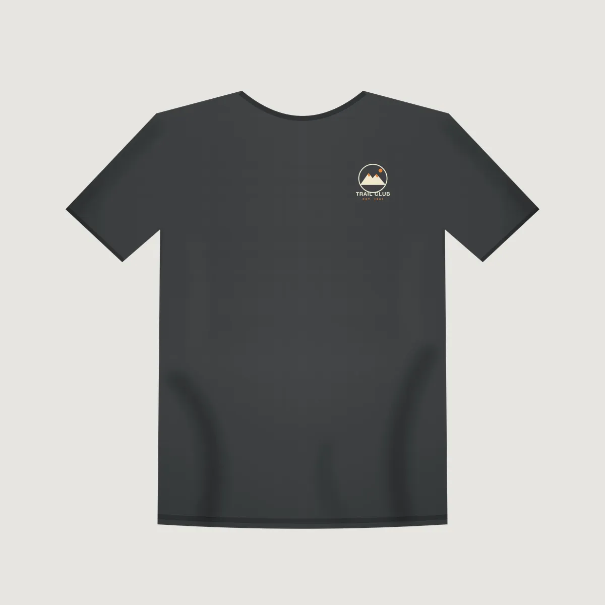 Charcoal t-shirt mockup with a small "Trail Club 1987" left chest print