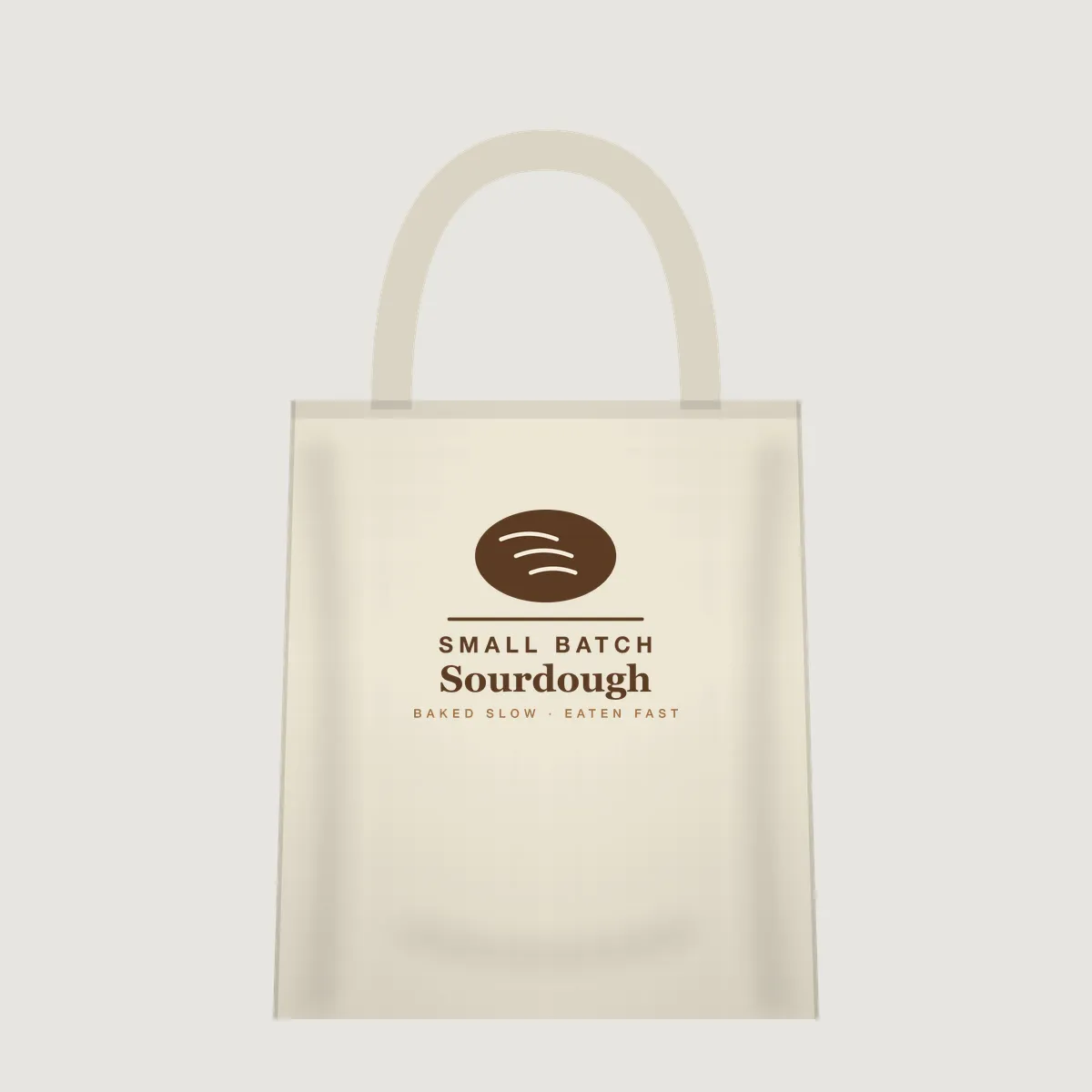 Natural canvas tote bag mockup with the "Small Batch Sourdough" print